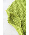 A loose, bouncy zigzag pleated pullover top