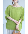 A loose, bouncy zigzag pleated pullover top