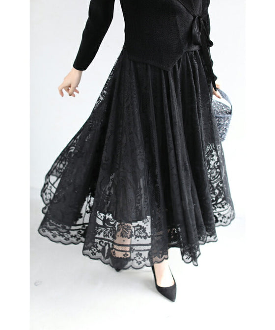 A luxurious, generous lace cache-coeur long dress