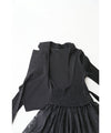 A luxurious, generous lace cache-coeur long dress