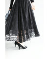 A luxurious, generous lace cache-coeur long dress