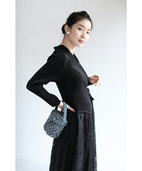 A luxurious, generous lace cache-coeur long dress