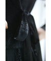 A luxurious, generous lace cache-coeur long dress