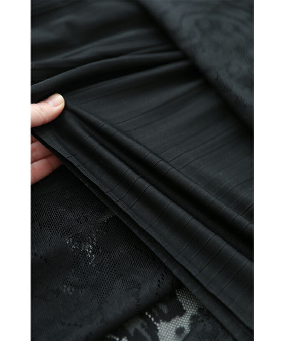 A luxurious, generous lace cache-coeur long dress