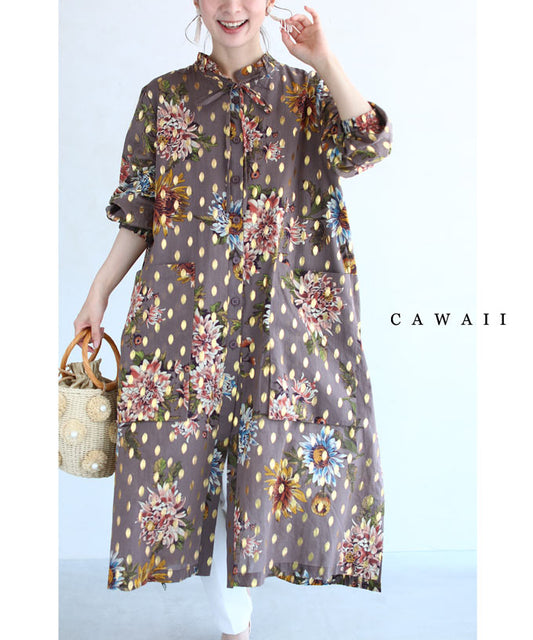 A medium-sized dress with a floral and oval dot pattern