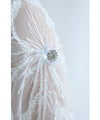 A cut-and-sew top with shimmering beads and light drops