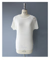A cut-and-sew top with shimmering beads and light drops