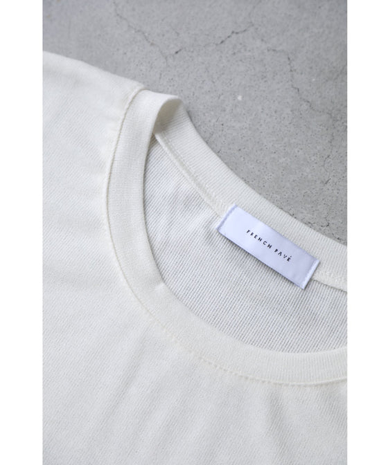A cut-and-sew top with shimmering beads and light drops