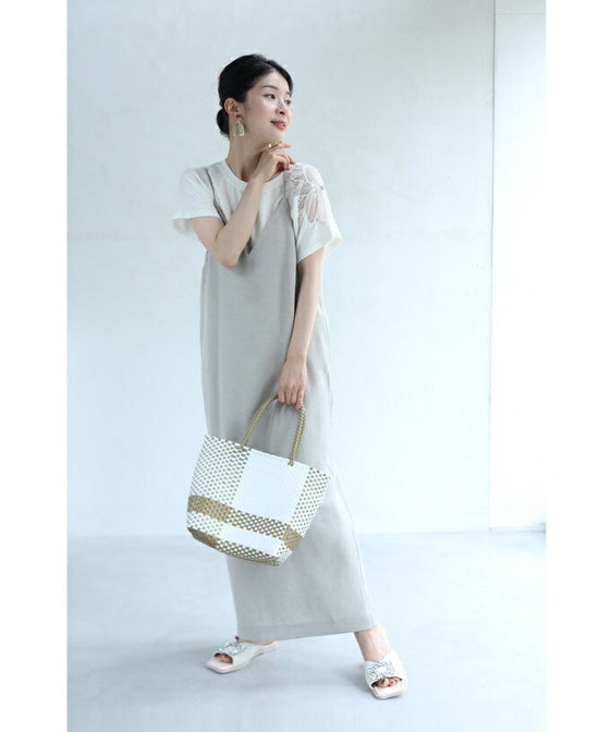 A cut-and-sew top with shimmering beads and light drops