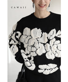  くしゅくしゅ花モチーフのニットトップス