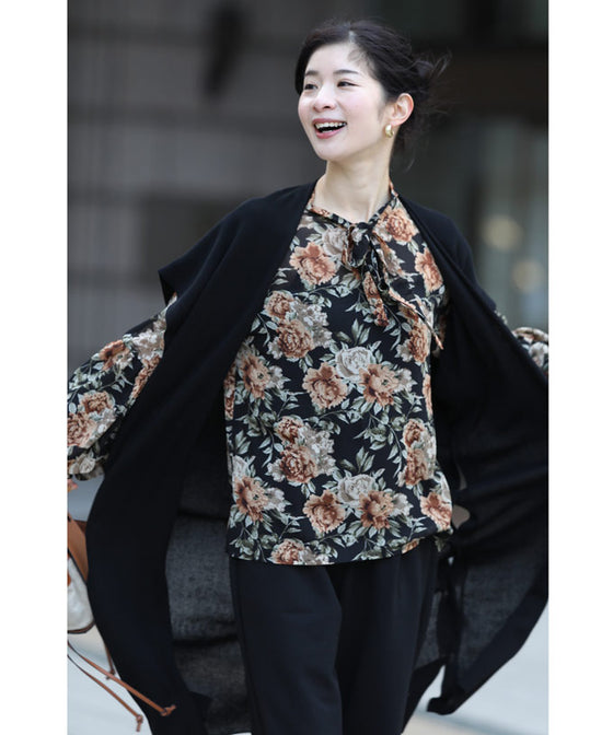 Elegant ribbon-tie blouse top with soft sleeves