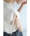 Glossy blouse top with graffiti floral embroidery on organza