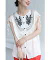 Glossy blouse top with graffiti floral embroidery on organza