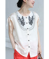 Glossy blouse top with graffiti floral embroidery on organza