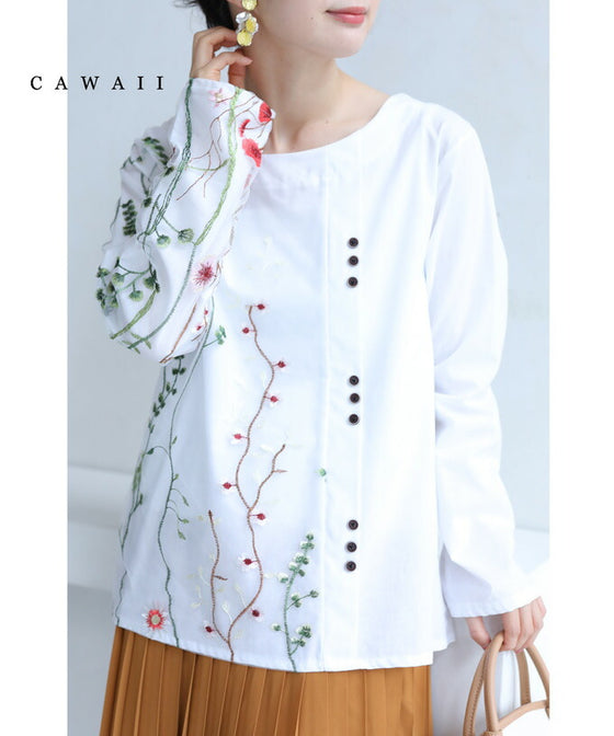 Asymmetrical blouse top with floral embroidery on tulle