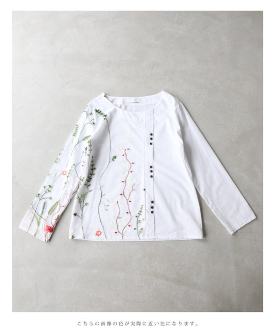 Asymmetrical blouse top with floral embroidery on tulle