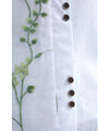 Asymmetrical blouse top with floral embroidery on tulle