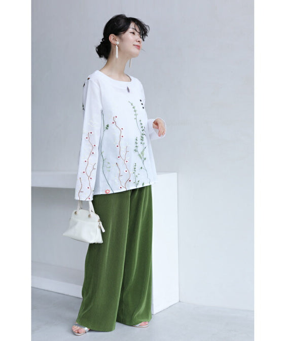 Asymmetrical blouse top with floral embroidery on tulle