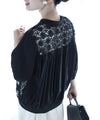 Cutout lace blouson with swaying pearl charms