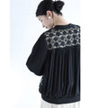Cutout lace blouson with swaying pearl charms