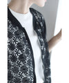 Cutout lace blouson with swaying pearl charms