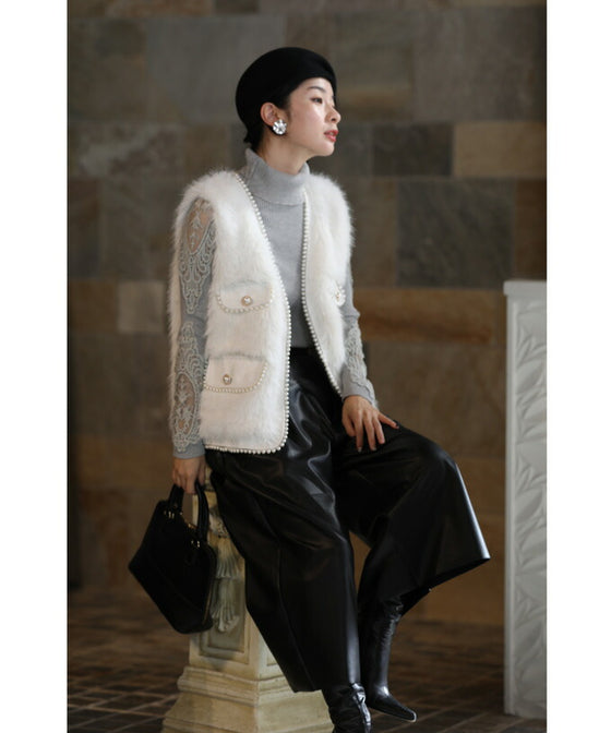 Fluffy white faux fur vest with luxurious pearl trim