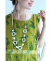 A refreshing yellow-green leaf patterned mid-length dress