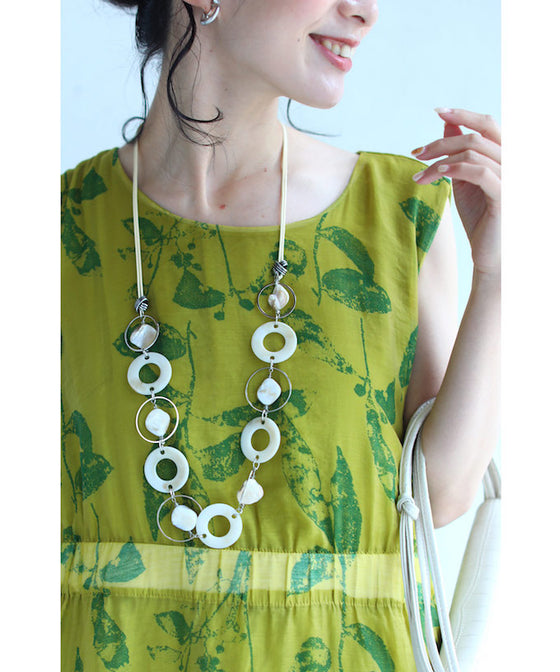 A refreshing yellow-green leaf patterned mid-length dress