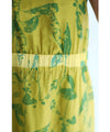 A refreshing yellow-green leaf patterned mid-length dress