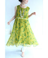 A refreshing yellow-green leaf patterned mid-length dress