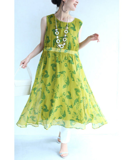 A refreshing yellow-green leaf patterned mid-length dress