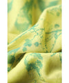 A refreshing yellow-green leaf patterned mid-length dress