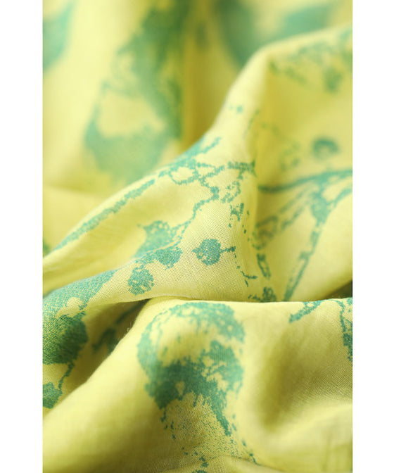 A refreshing yellow-green leaf patterned mid-length dress