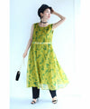 A refreshing yellow-green leaf patterned mid-length dress