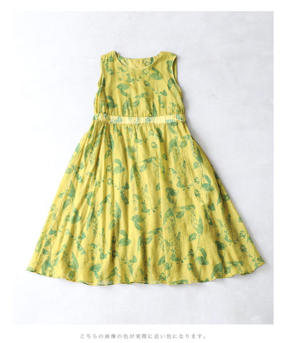 A refreshing yellow-green leaf patterned mid-length dress