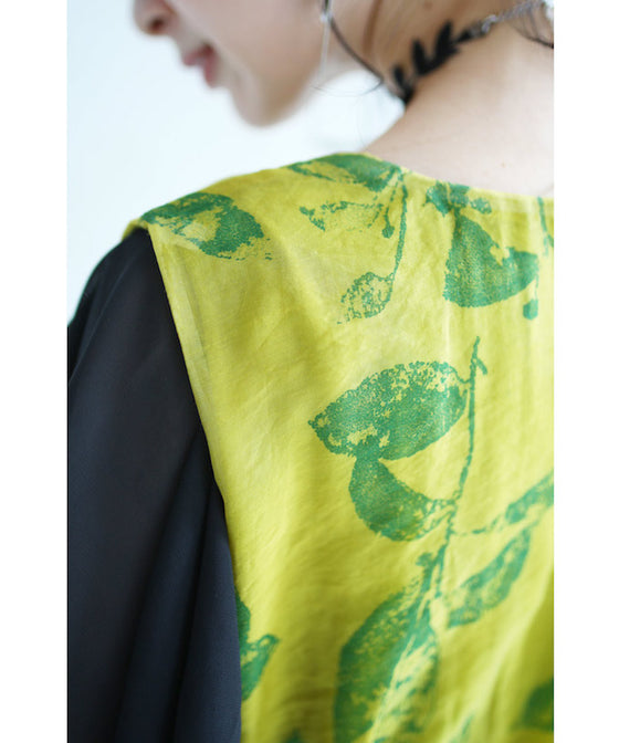 A refreshing yellow-green leaf patterned mid-length dress