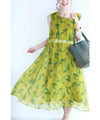 A refreshing yellow-green leaf patterned mid-length dress