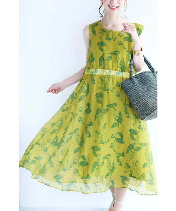 A refreshing yellow-green leaf patterned mid-length dress