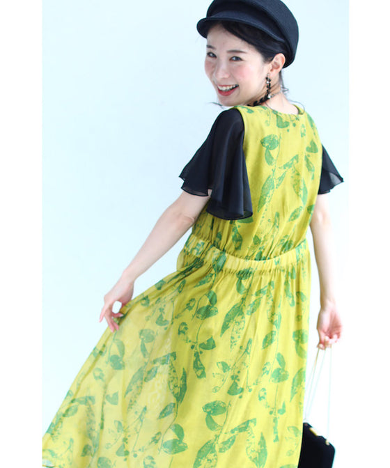 A refreshing yellow-green leaf patterned mid-length dress