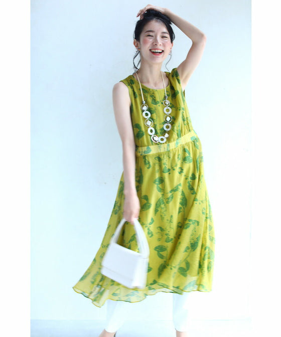A refreshing yellow-green leaf patterned mid-length dress