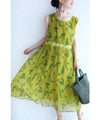 A refreshing yellow-green leaf patterned mid-length dress
