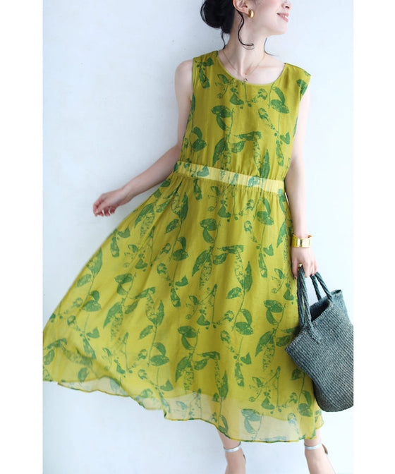 A refreshing yellow-green leaf patterned mid-length dress