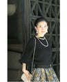 Knit top with puffed sleeves and off-neck puffed sleeves