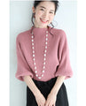 Knit top with puffed sleeves and off-neck puffed sleeves