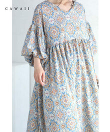  A cute and elegant long dress with fluffy puff sleeves