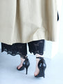 Wide pants with floral embroidery to wear under a dress
