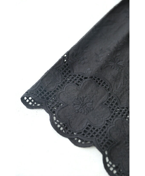 Wide pants with floral embroidery to wear under a dress