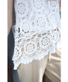 A stylish layered item: knitted lace vest