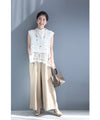 A stylish layered item: knitted lace vest