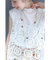 A stylish layered item: knitted lace vest